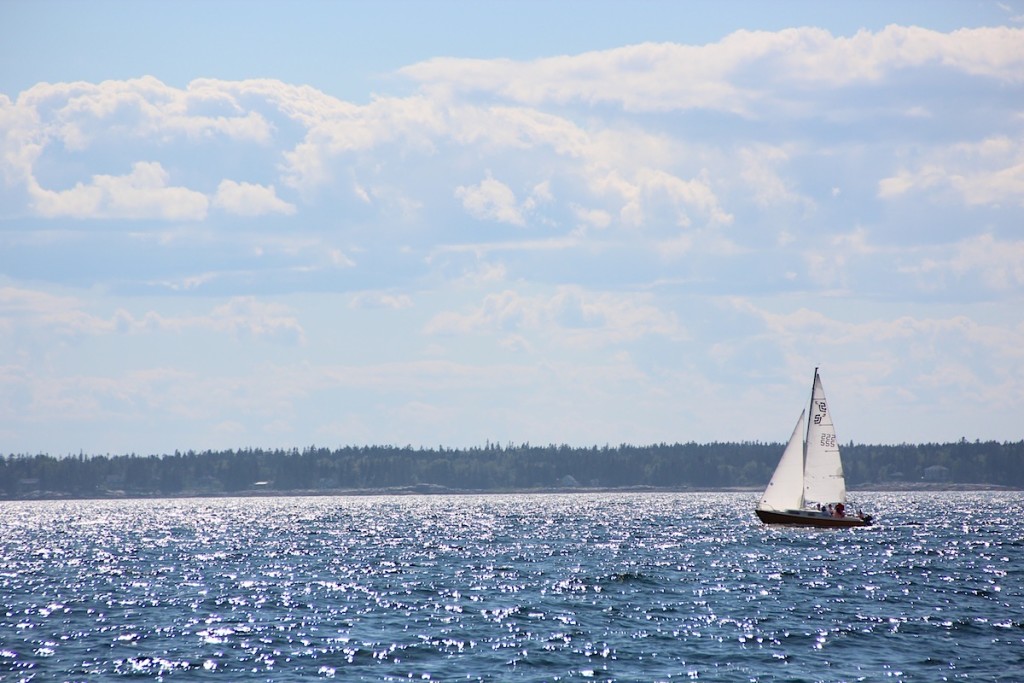 Our San Juan 21, Quasar, sailing on Booth Bay on a sparkly August day